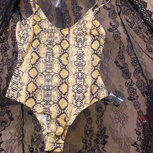 Lime green yellow-ish snakes skin body suit